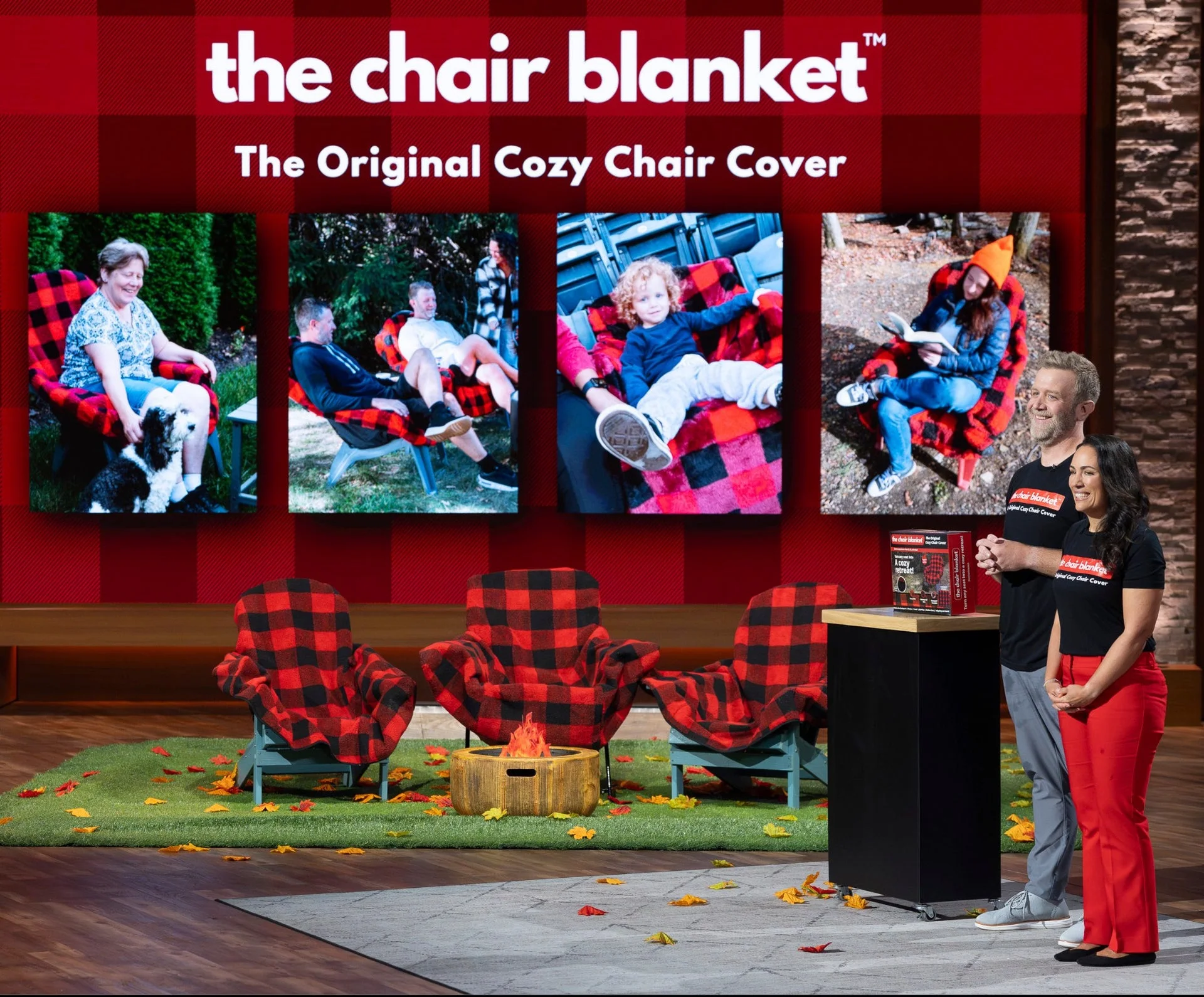 The Chair Blanket Shark Tank set with four customer photos on screens and the two founders standing at the right
