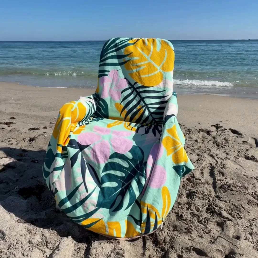 The Beach Towel Chair Blanket™ on a sandy beach